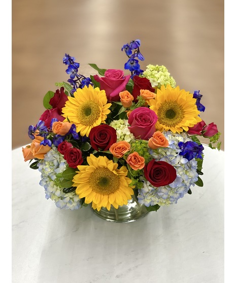 Cube of rainbow-colored flowers