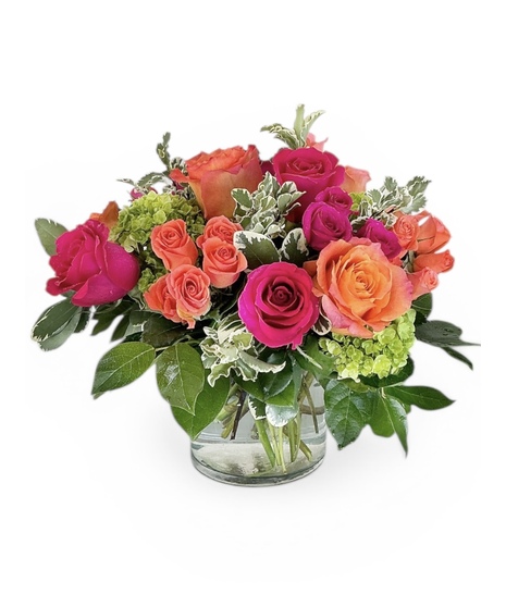 Blend of garden flowers in peach, green and pink