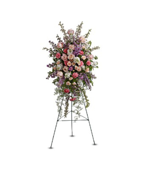 Standing sympathy spray of pink and purple fresh flowers 